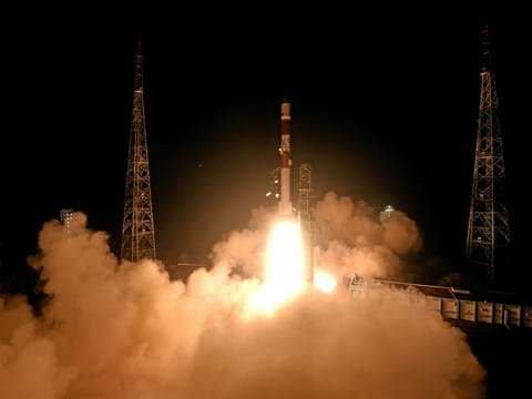 This handout photograph taken and released  on December 30, 2024 by the Indian Space Research Organisation (ISRO) shows the launch of the ISRO PSLV-C60 rocket carrying two SpaDeX satellites SDX01 (Chaser) and SDX02 (Target) from the Satish Dhawan Space Centre in Sriharikota.