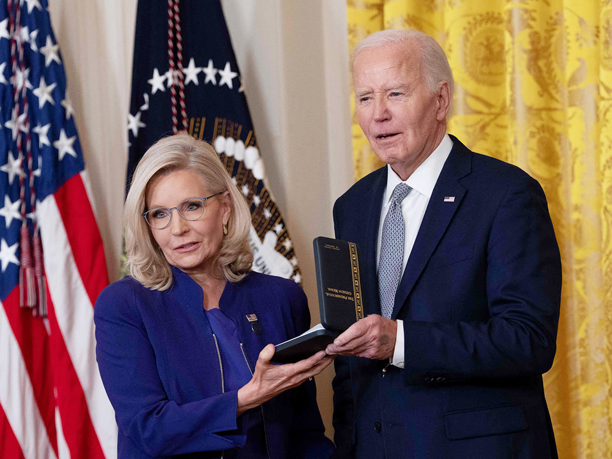 Former Congresswoman Liz Cheney receives the Presidential Citizens Medal from US President Joe Biden during a ceremony at the White House in Washington, DC, on January 2, 2025. 