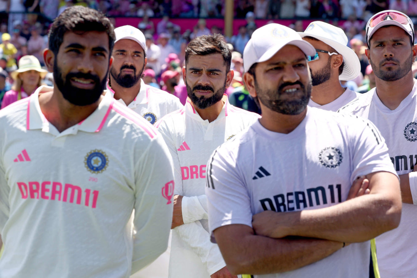 Indian players watch during the trophy ceremony after the fifth cricket Test match against Australia at The SCG in Sydney on Sunday.