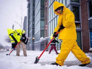 In pictures: Winter storm in US brings heavy snow and travel delays