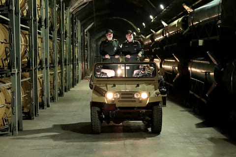 Hossein Salami (left), head of Iran's Revolutionary Guards and Amir Ali Hajizadeh, head of the Guard's airforce, touring an underground missile base in an undisclosed location in Iran. 