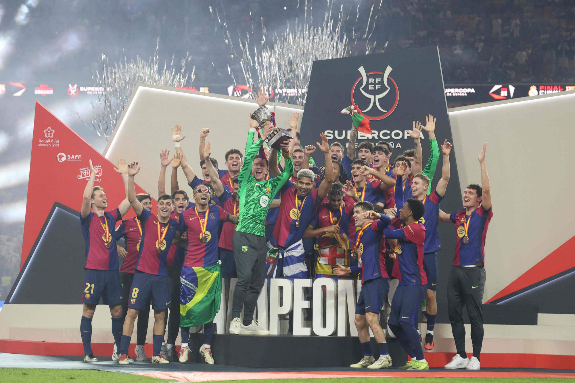 Barcelona celebrate their triumph in the Super Cup