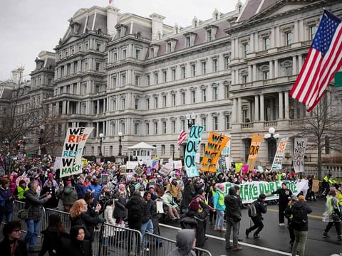 Protestors representing a variety of rights groups attend the "People's March" on January 18, 2025 in Washington, DC. 