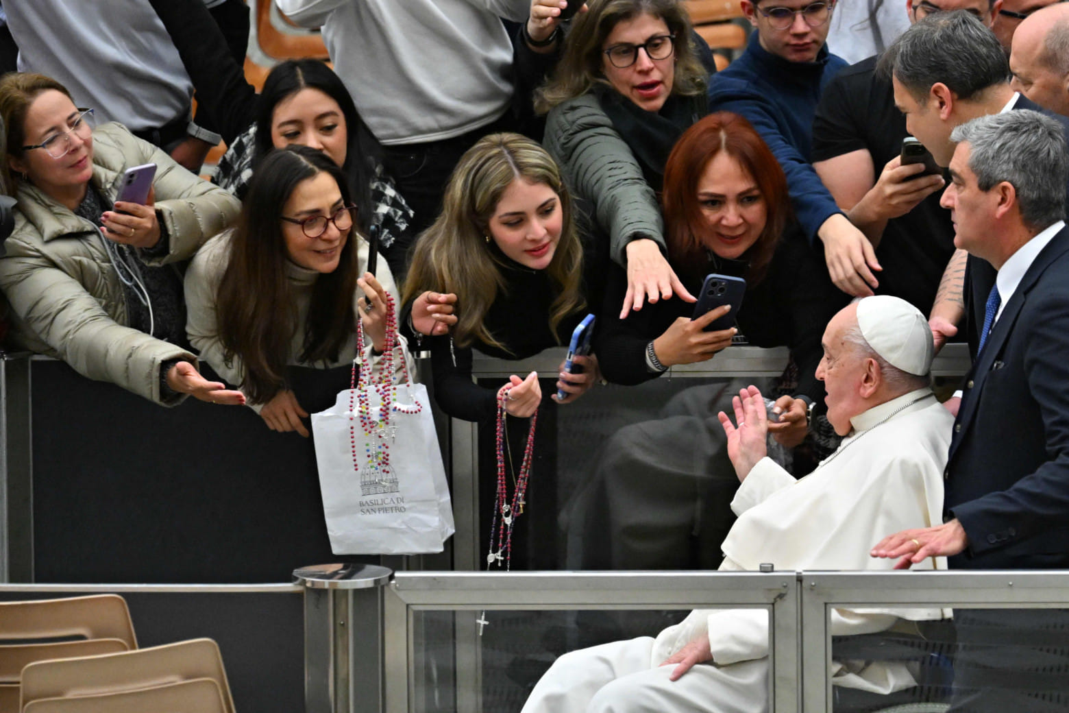 Pope Francis waves as he leaves the weekly general audience at Paul-VI hall in the Vatican on January 22, 2025.  