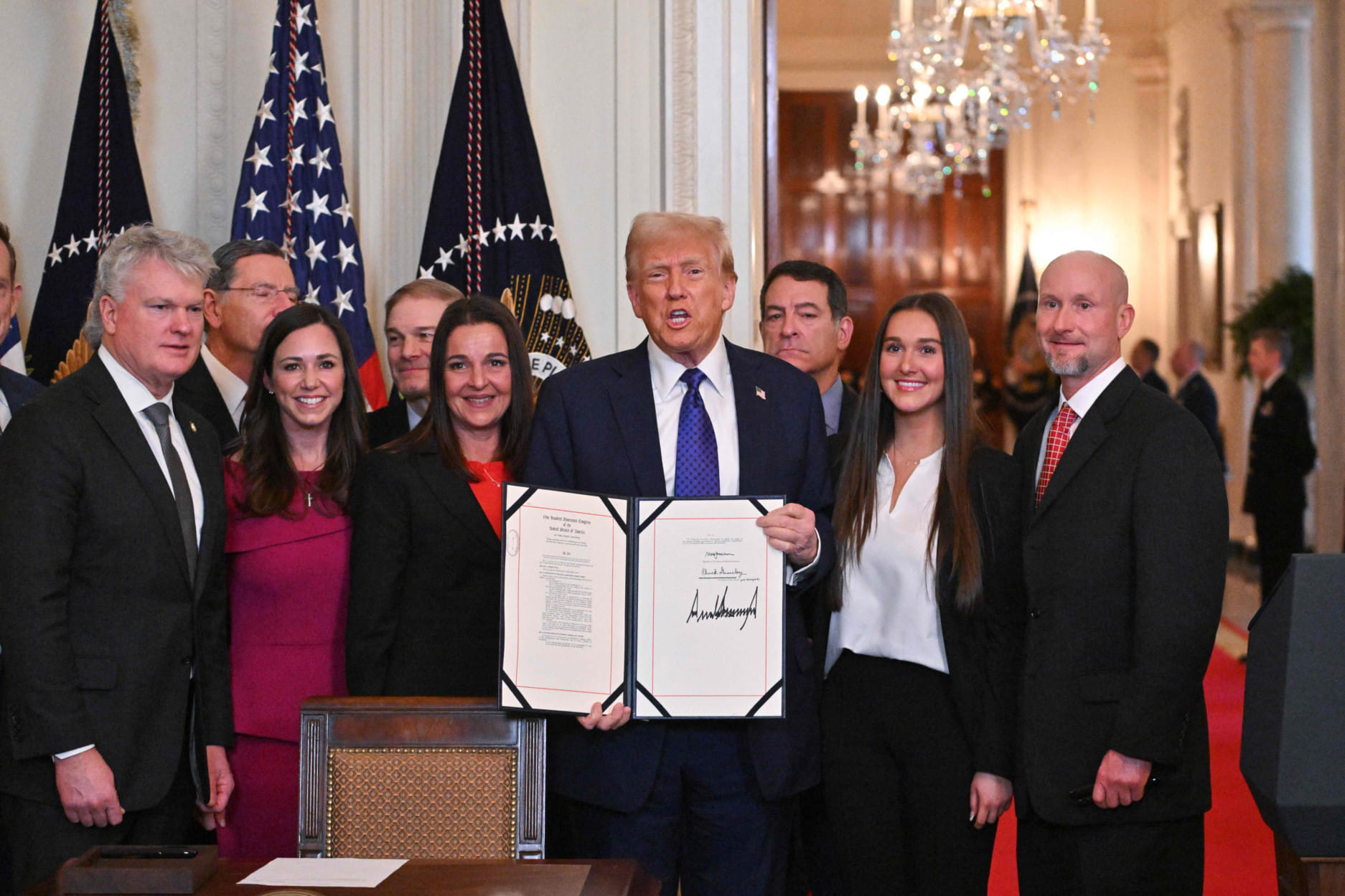US President Donald Trump after signing the Laken Riley Act in the East Room of the White House in Washington, DC, January 29, 2025. The Laken Riley Act -- which mandates the detention of undocumented immigrants charged with theft-related crimes -- is named for a 22-year-old student murdered by a Venezuelan man with no papers who was wanted for shoplifting.