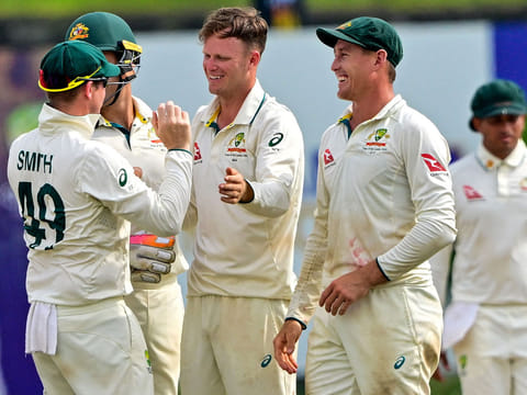 Australia's Matthew Kuhnemann (C) celebrates with teammates after taking the wicket of Sri Lanka's Jeffrey Vandersay during the fourth day of the first Test cricket match between Sri Lanka and Australia at the Galle International Cricket Stadium in Galle on February 1, 2025.