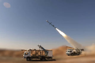 Iran unveils new ballistic missile in show of force