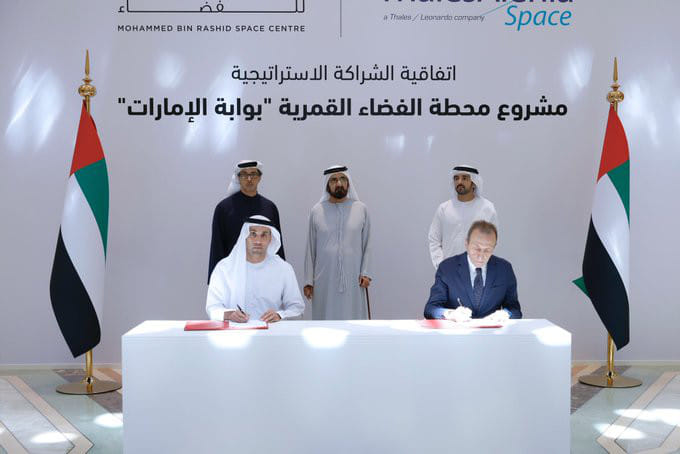 Sheikh Mohammed bin Rashid Al Maktoum, Sheikh Hamdan bin Mohammed bin Rashid and Sheikh Mansour bin Zayed Al Nahyan witness the signing of 