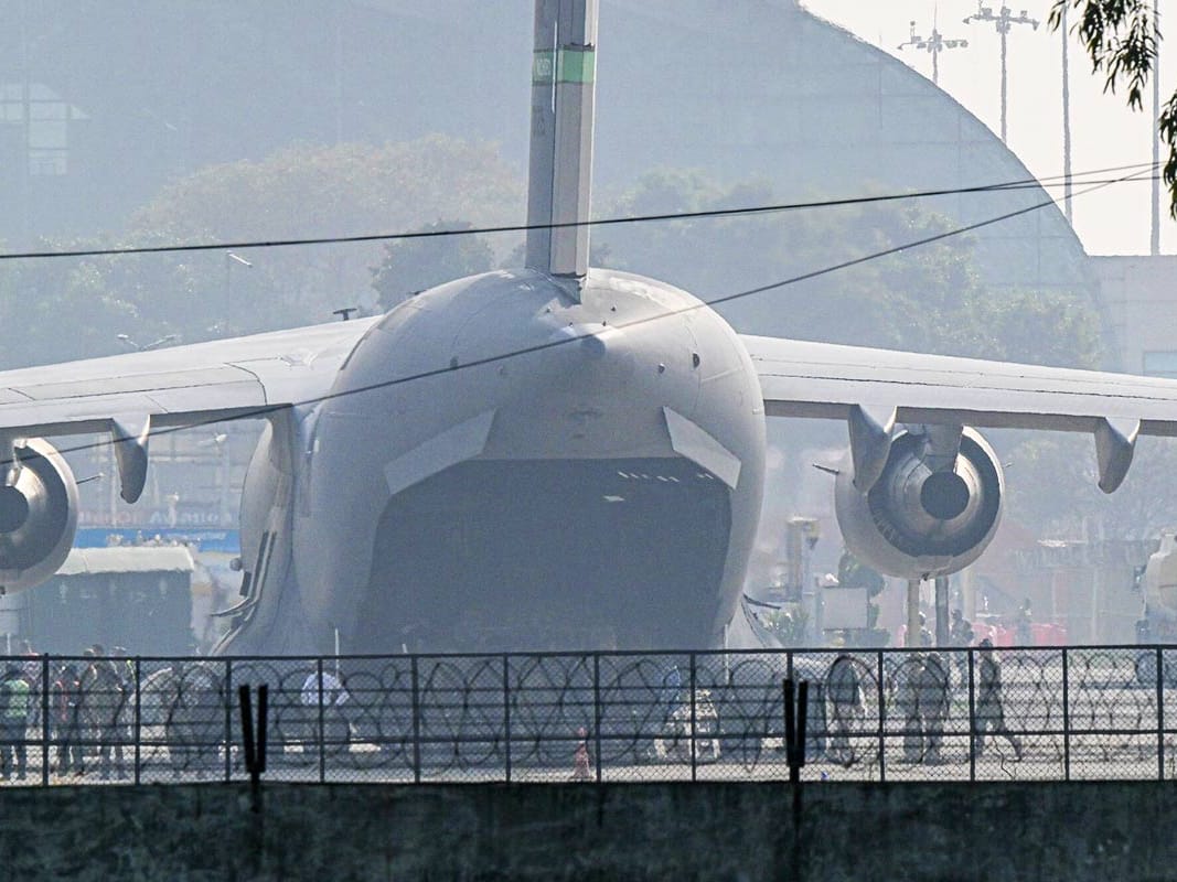 A US Air Force C-17 Globemaster III aircraft carrying undocumented Indian migrants deported by the US at Sri Guru Ram Dass Jee International Airport in Amritsar, Punjab, India, on Wednesday, Feb. 5, 2025.