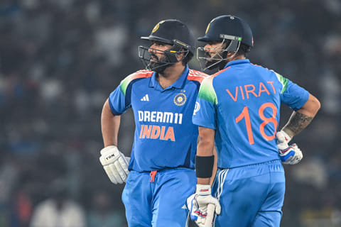 India's Virat Kohli (R) along with his captain Rohit Sharma.