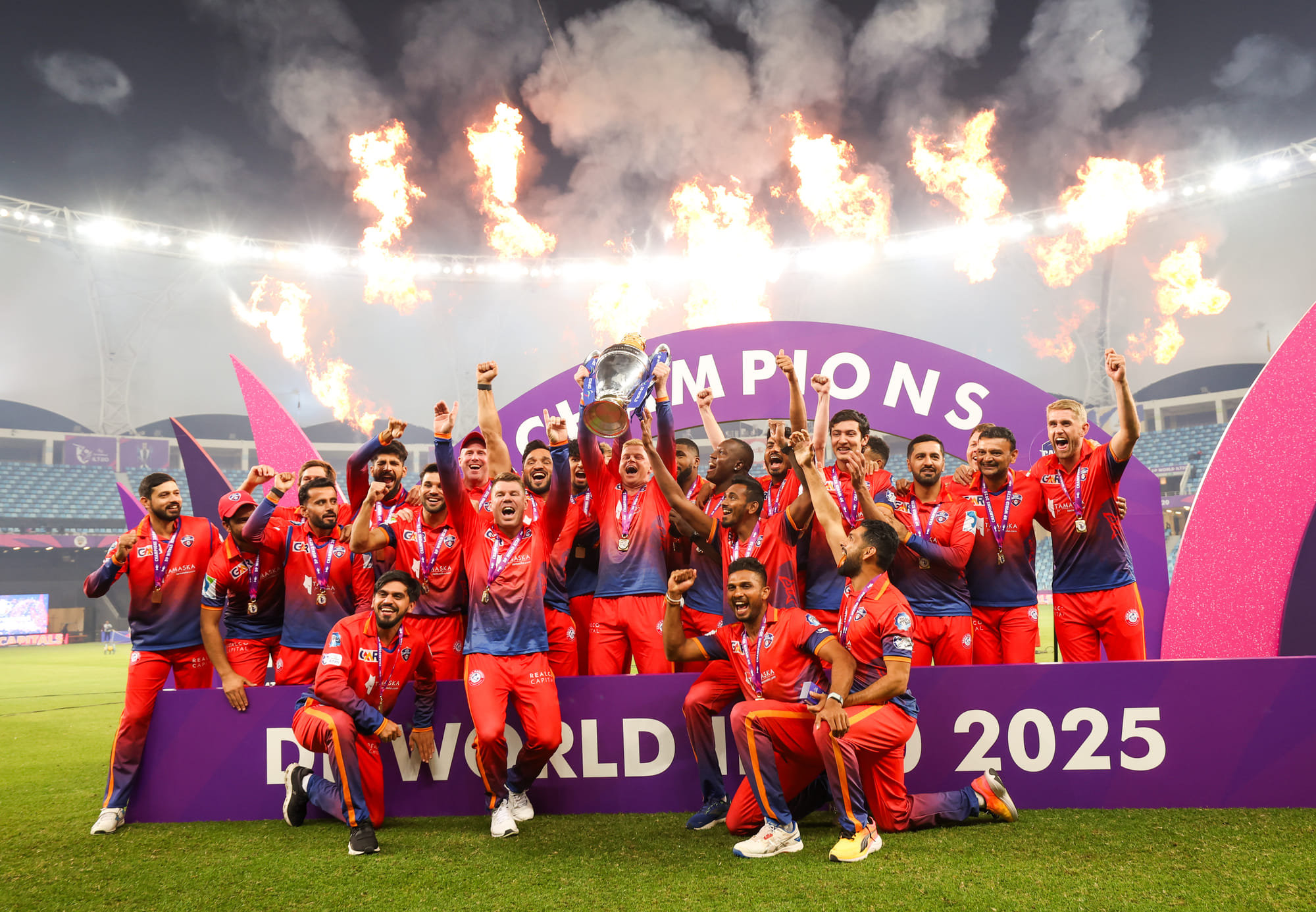 Dubai Capitals players celebrate after winning the third edition of DP World ILT20  at Dubai International stadium on Sunday. 
