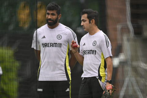 Indias head coach Gautam Gambhir (right) speaks with Jasprit Bumrah during a practice session in Sydney.
