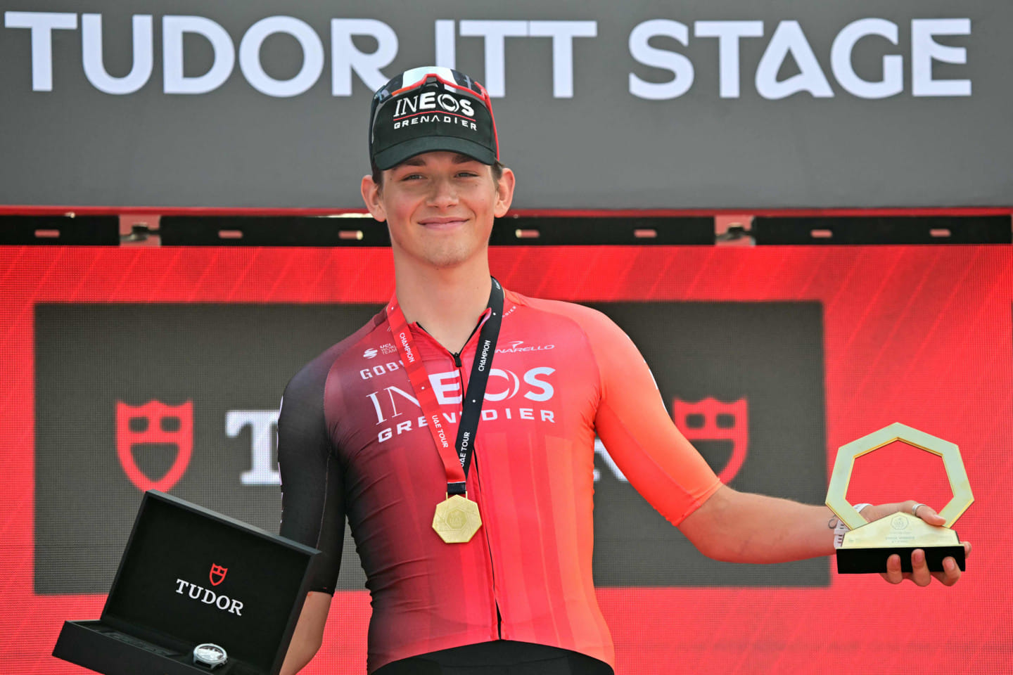 INEOS Grenadiers' British rider Joshua Tarling celebrates on the podium after winning the second stage of the UAE Tour cycling race in Al Hudayriyat island in Abu Dhabi on February 18.