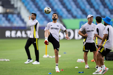 India's Virat Kohli controls a football during a practice session at the Dubai International Stadium in Dubai on February 19.