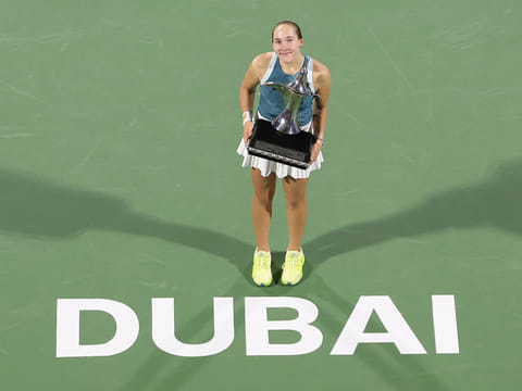 Mirra Andreeva with the Dubai Duty Free Tennis Championship trophy