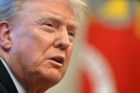US President Donald Trump speaks to the press after signing an Executive Order at the Oval Office of the White House in Washington, DC on February 25, 2025.