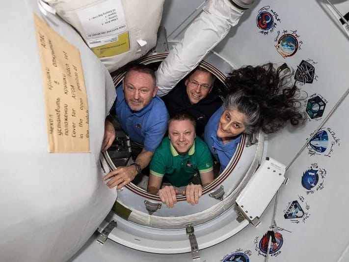 This photo provided by NASA shows the four crew members of NASA’s SpaceX Crew-9 mission, including NASA astronauts Nick Hague, Suni Williams, and Butch Wilmore, along with Roscosmos cosmonaut Aleksandr Gorbunov, posing for a photo aboard the International Space Station on February 26, 2025.