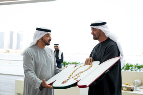 Sheikh Mohamed bin Zayed Al Nahyan presents the Order of the Mother of the Nation to Sheikh Hamdan bin Zayed Al Nahyan during the seventh session of the Sheikha Fatima bint Mubarak Excellence and Community Intelligence Program Award Ceremony in Abu dhabi on Wednesday.