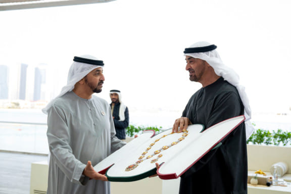 Sheikh Mohamed bin Zayed Al Nahyan presents the Order of the Mother of the Nation to Sheikh Hamdan bin Zayed Al Nahyan during the seventh session of the Sheikha Fatima bint Mubarak Excellence and Community Intelligence Program Award Ceremony in Abu dhabi on Wednesday.
