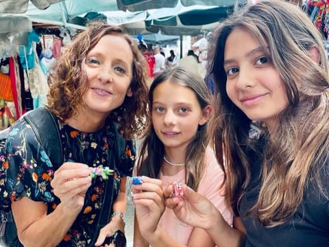 Julie Cobalt with her daughters: Cobalt founded a meetup and support group for women in the UAE, fostering a strong community of comfort and solidarity.



