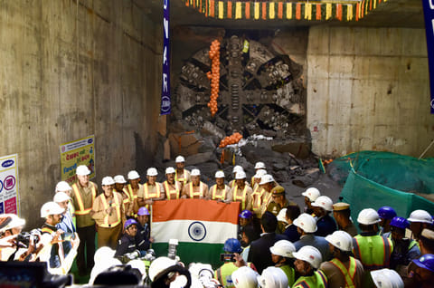 Union Minister of Housing and Urban Affairs Manohar Lal Khattar in a group picture with engineers and metro construction workers during Tunnel breakthrough for DMRC.