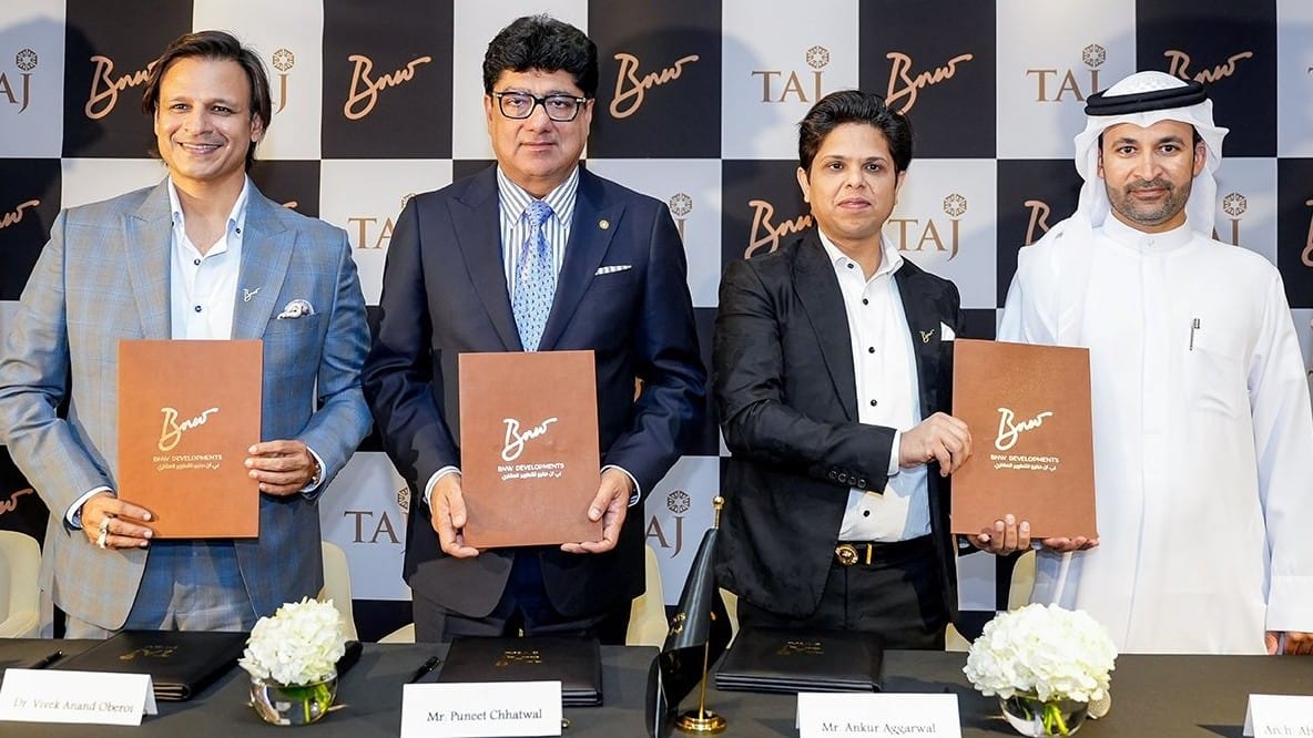 Dr. Vivek Anand Oberoi, Co-Founder and Managing Director, BNW Developments; Puneet Chhatwal, Managing Director & CEO, IHCL; Ankur Aggarwal, Chairman and Founder, BNW Developments with Abdulla Al Abdouli, CEO, Marjan
