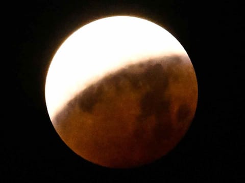 The full moon, also known as the ‘Blood Moon,’ is seen in Mexico City, during a lunar eclipse. Stargazers across a swathe of the world marvelled at a dramatic red ‘Blood Moon’ during a rare total lunar eclipse. 