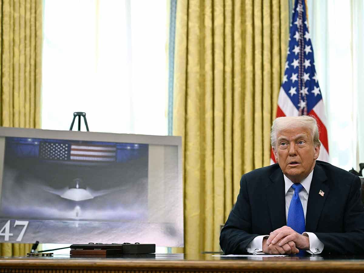 US President Donald Trump speaks during an event in the Oval Office of the White House in Washington, DC, on March 21, 2025. Trump announced the award to Boeing of a major contract for the Air Force's high-tech next-generation F-47 fighter plane.