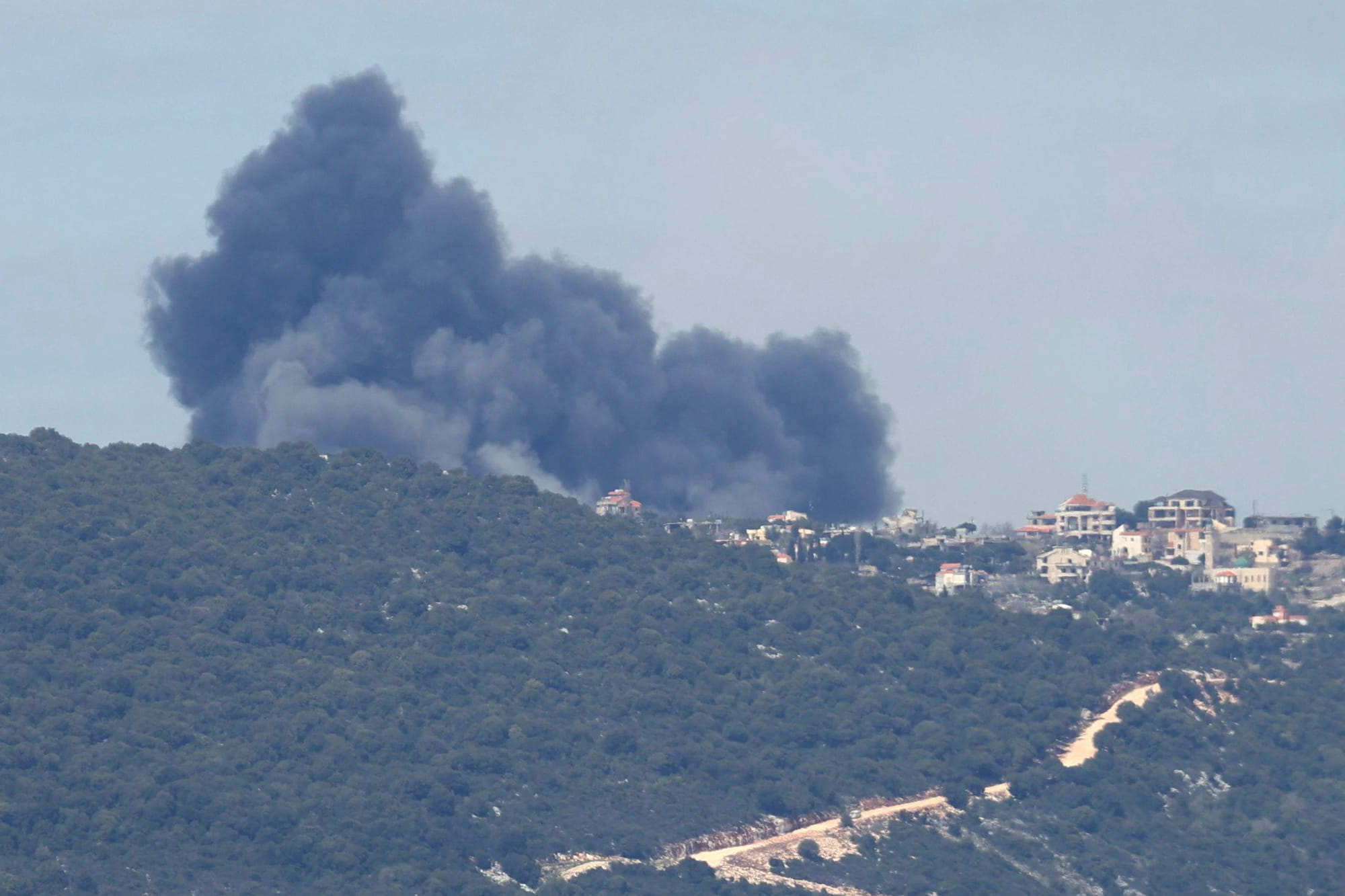 Smoke billows after an Israeli airstrike on the southern Lebanese village of Sejoud on March 22, 2025. 