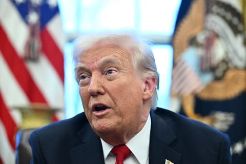 US President Donald Trump announces tariffs on auto imports in the Oval Office of the White House in Washington, DC, on March 26, 2025.