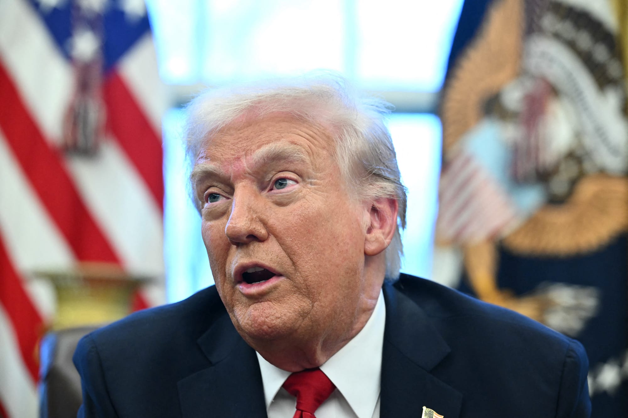 US President Donald Trump announces tariffs on auto imports in the Oval Office of the White House in Washington, DC, on March 26, 2025.