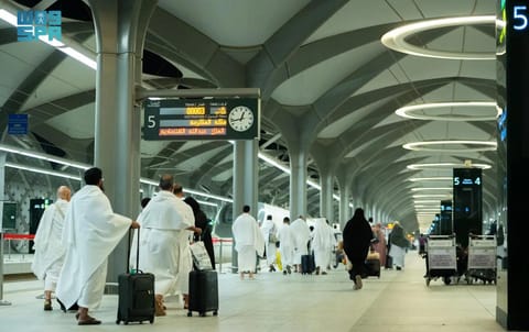 Pilgrims on way to board the high-speed Haramain train that connects the Saudi holy cities of Mecca and Medina. 