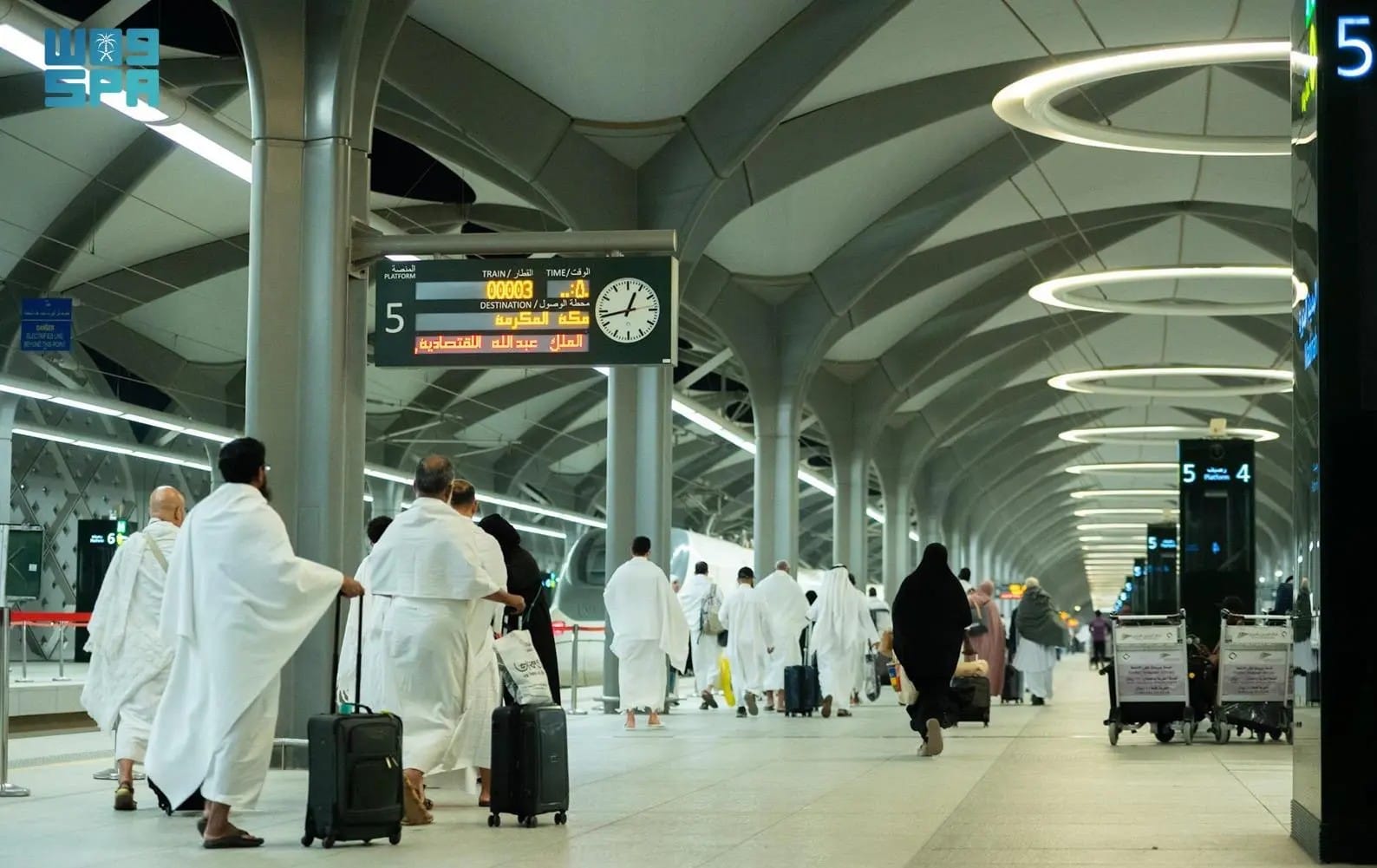 Pilgrims on way to board the high-speed Haramain train that connects the Saudi holy cities of Mecca and Medina. 