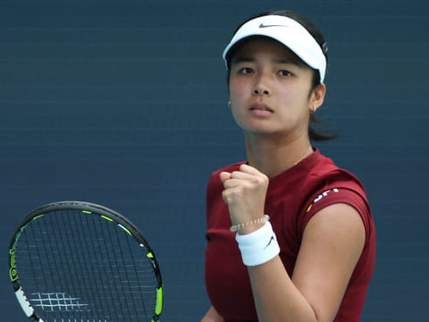 Alexandra Eala of the Philippines reacts after winning a point against Iga Swiatek of Poland