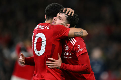 Morgan Gibbs-White (L) and Neco Williams celebrate Forest's victory