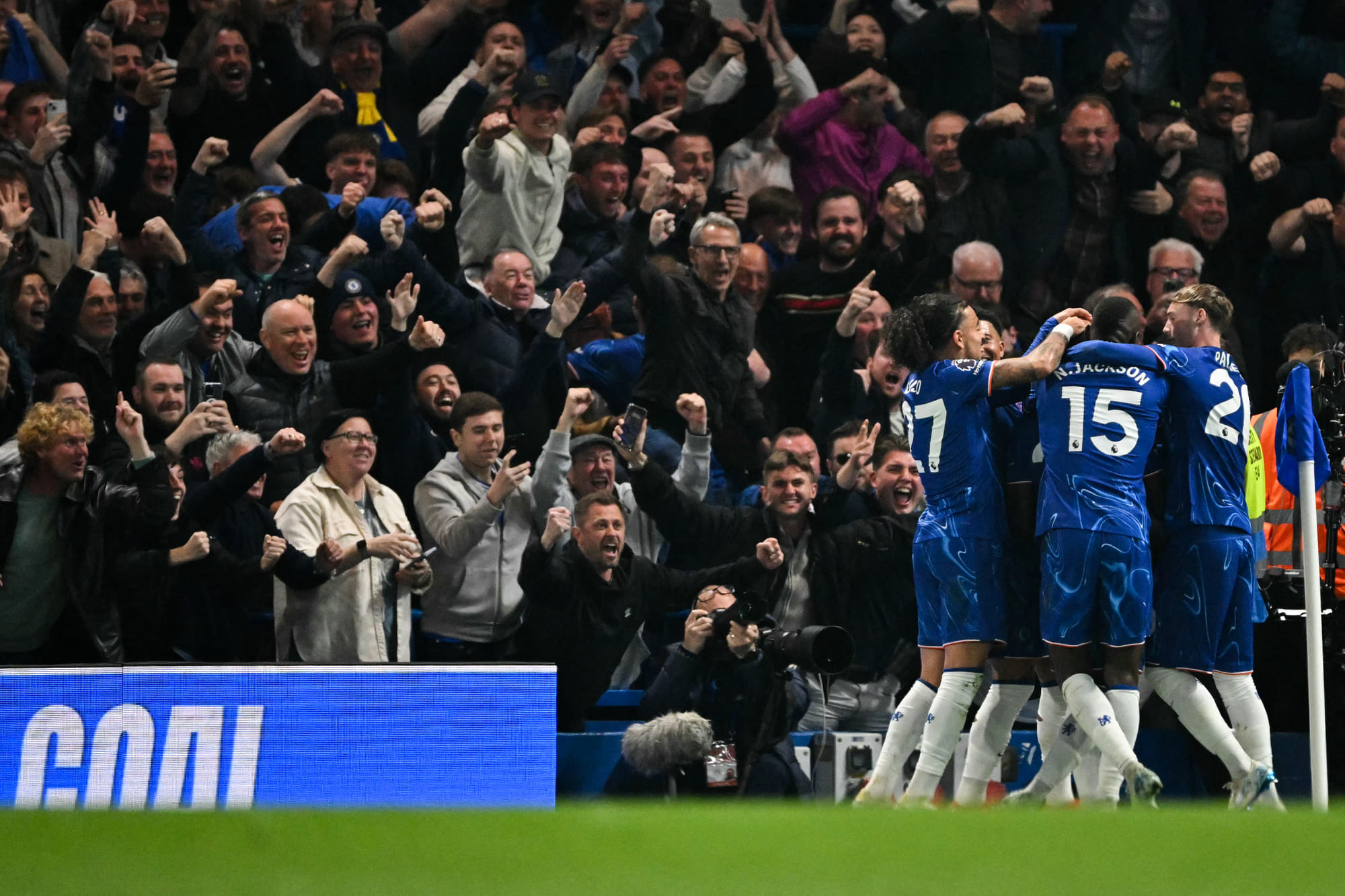 Chelsea's Ecuadorian midfielder Moises Caicedo celebrates with teammates after scoring his team second goal during the English Premier League football match against Tottenham Hotspur at Stamford Bridge in London on April 3.