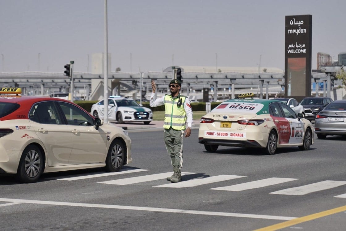 Officers are seen managing crowds, guiding traffic, and monitoring live feeds at the command centre. 