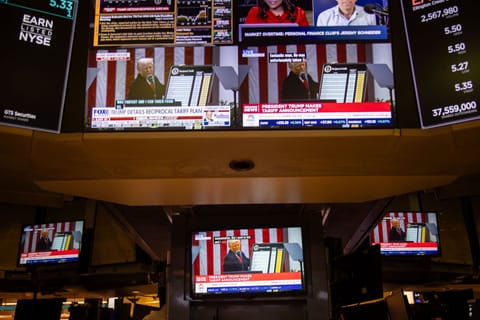 Traders on the floor of the NYSE as Trump announces new tariffs.