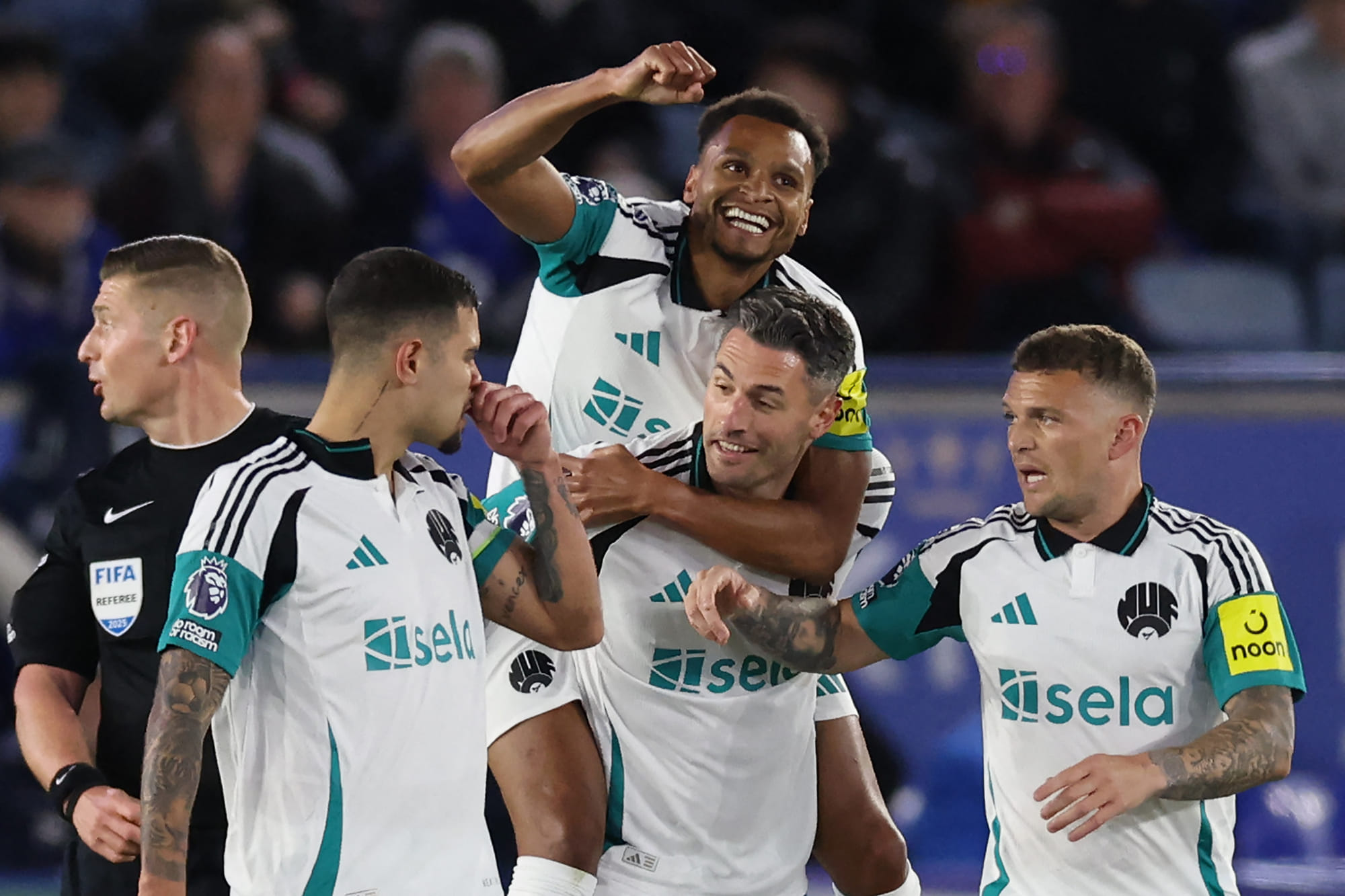 Jacob Murphy (C) celebrates scoring