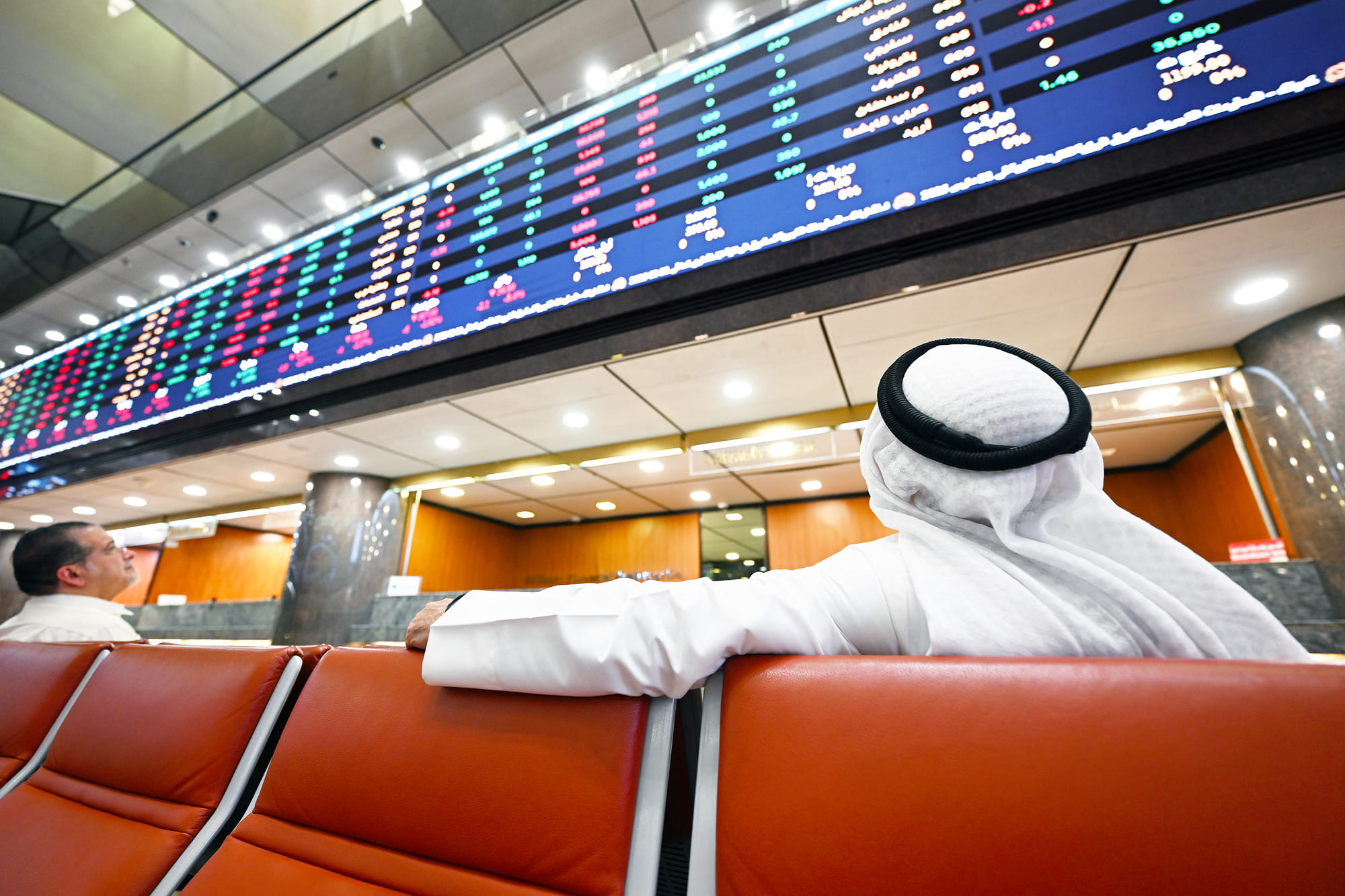Kuwaiti traders follow the stock market activity at Boursa Kuwait