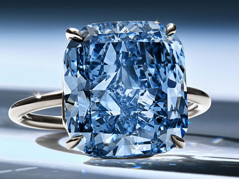 The Mediterranean Blue alongside 'The Golden Canary' and 'The Desert Rose' diamonds. The blue diamond is coming up for auction in Geneva next month.