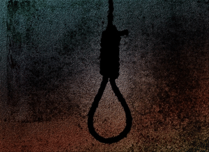 After killing wife, he tried to hang himself, then he consumed poison, and after that used a cutting machine on his body.