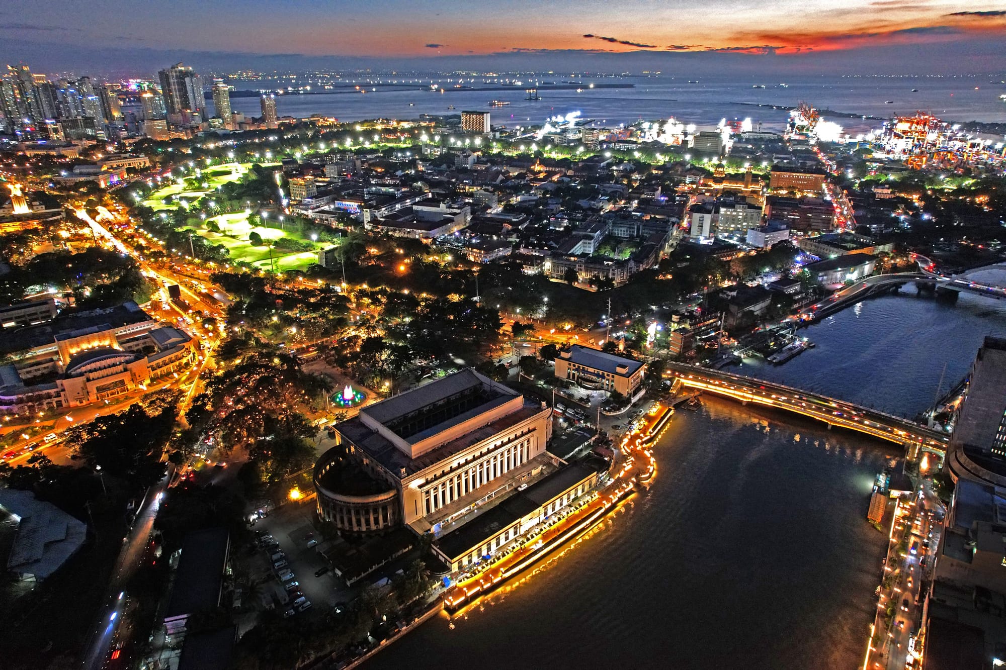 A view of the City of Manila, with the Pasig River in the foreground and Manila Bay in the backdrop.