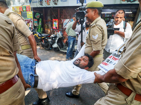 Police detain a National Students' Union of India (NSUI) supporter during a protest against the ED chargesheet against Congress Parliamentary Chairperson Sonia Gandhi, and party MP Rahul Gandhi and others in the National Herald case, in Lucknow on Wednesday, April 16. 