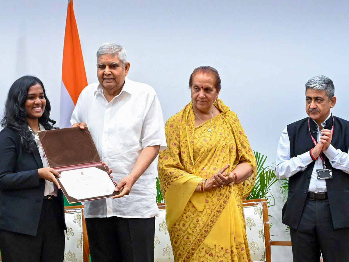 Vice President and Rajya Sabha Chairman Jagdeep Dhankhar presents a certificate to an intern during the Valedictory Function of the 6th Rajya Sabha Internship Program, at Vice-President's Enclave in New Delhi on Thursday. Dhankar's wife Sudesh Dhankhar also seen. 