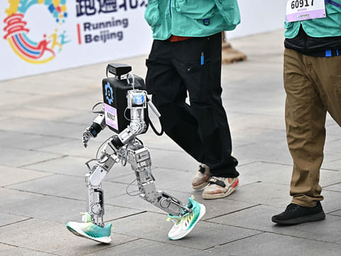 Step by mechanical step, dozens of humanoid robots took to the streets of Beijing early Saturday, joining thousands of their flesh-and-blood counterparts in a world-first half marathon showcasing China's drive to lead the global race in cutting-edge technology.