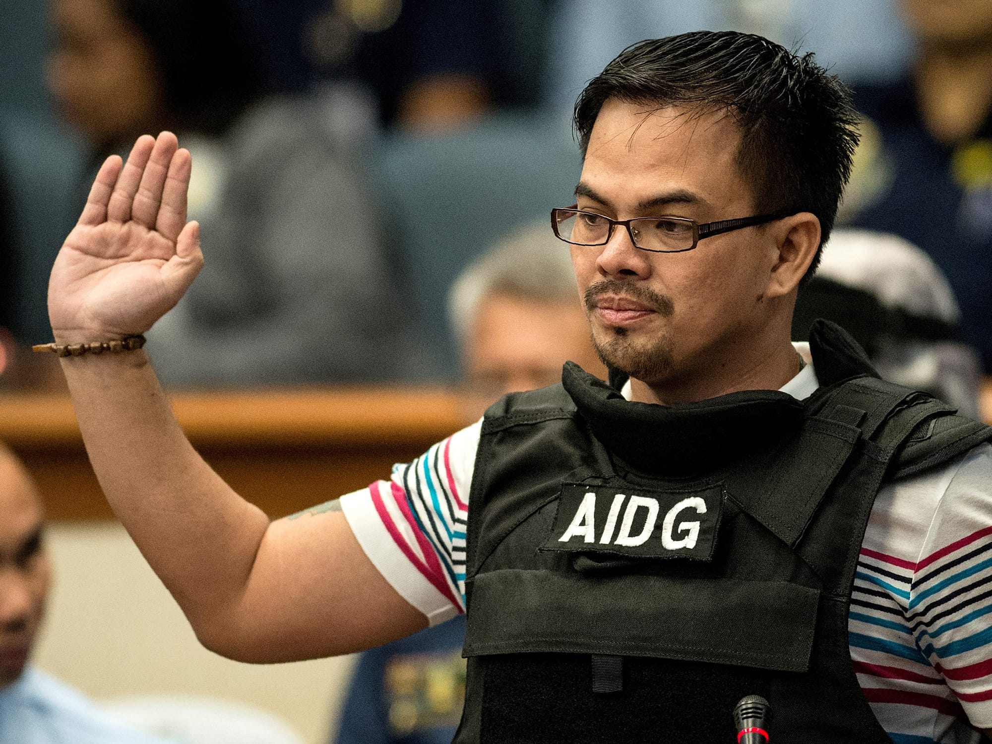 At a rally this month, someone from the crowd fired a bullet that went through Kerwin Espinosa's chest and exited his arm, leaving him bleeding but alive.