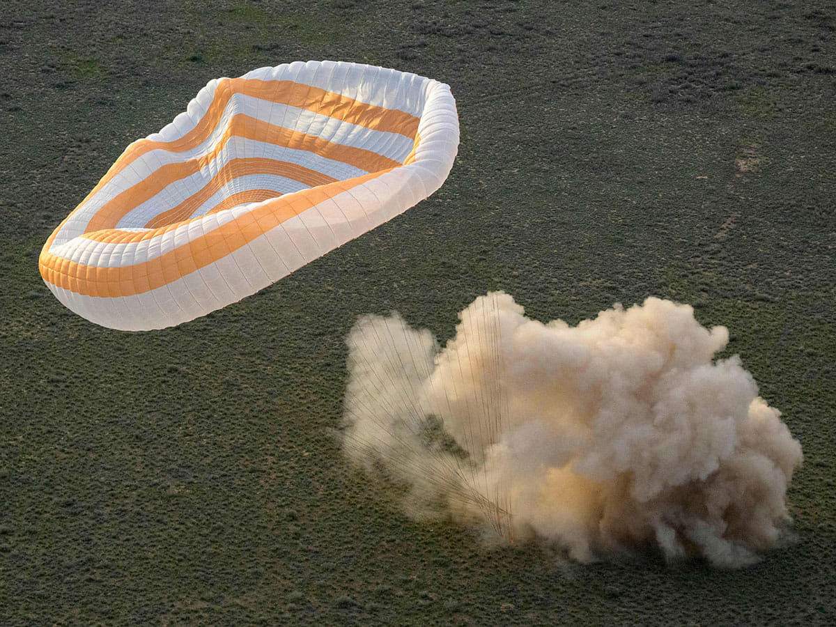 Soyuz MS-26 spacecraft is seen as it lands in a remote area near the town of Zhezkazgan, Kazakhstan.