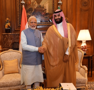 Modi and Saudi Arabia's Crown Prince Mohammed bin Salman in a file photo. Modi embarks on a two-day visit to Saudi Arabia.