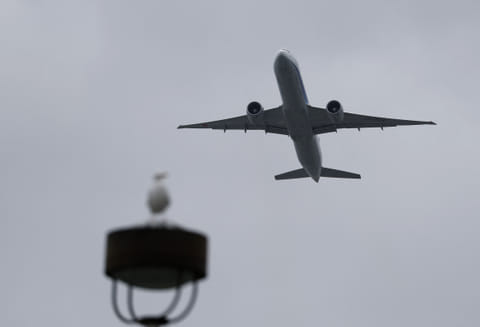 Fellow passengers and crew members had restrained the man while the plane was in the air.